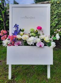 FASH events welkomstbord met bloemen